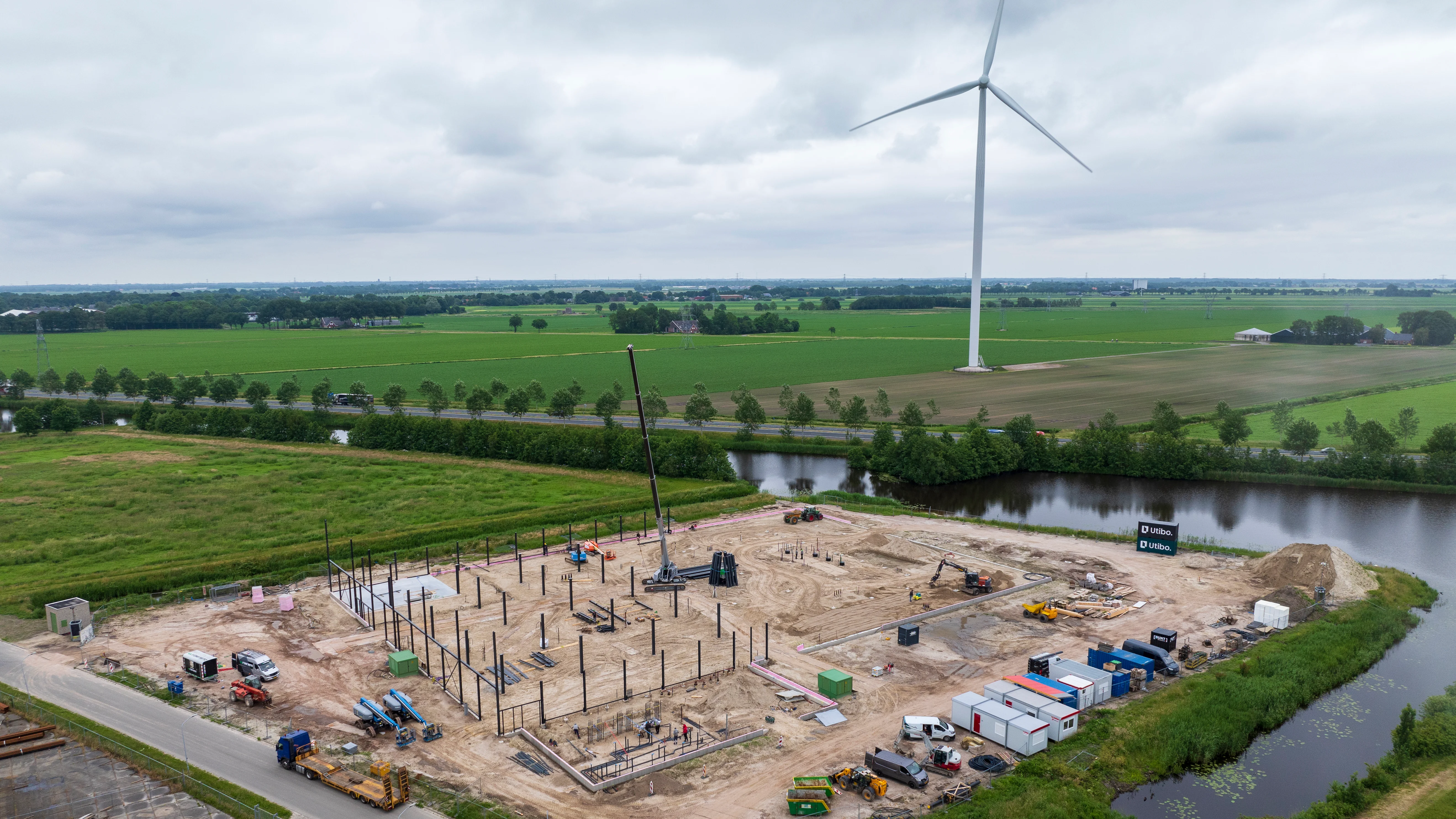 construction site drone photography, building progress documentation, aerial construction view, professional drone footage