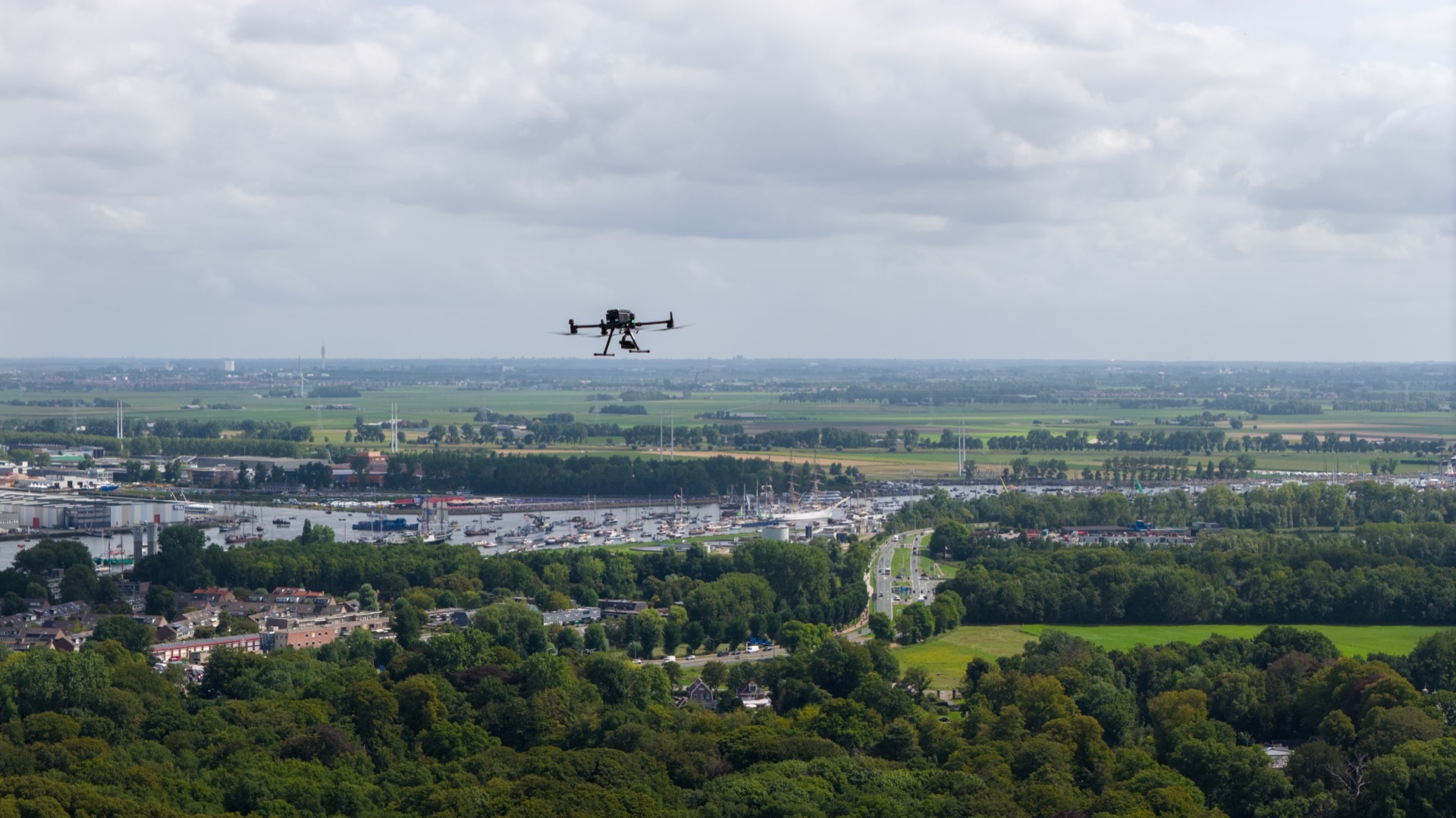 visual drone inspection, industrial worker inspecting equipment, professional drone photography, aerial inspection technology